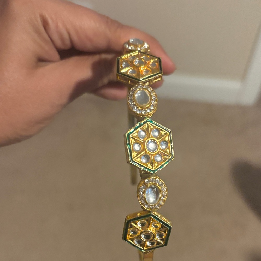 Elegant Gold and Green Bracelet